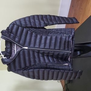 Girls black Calvin Klein packable lightweight premium down jacket.  (M)